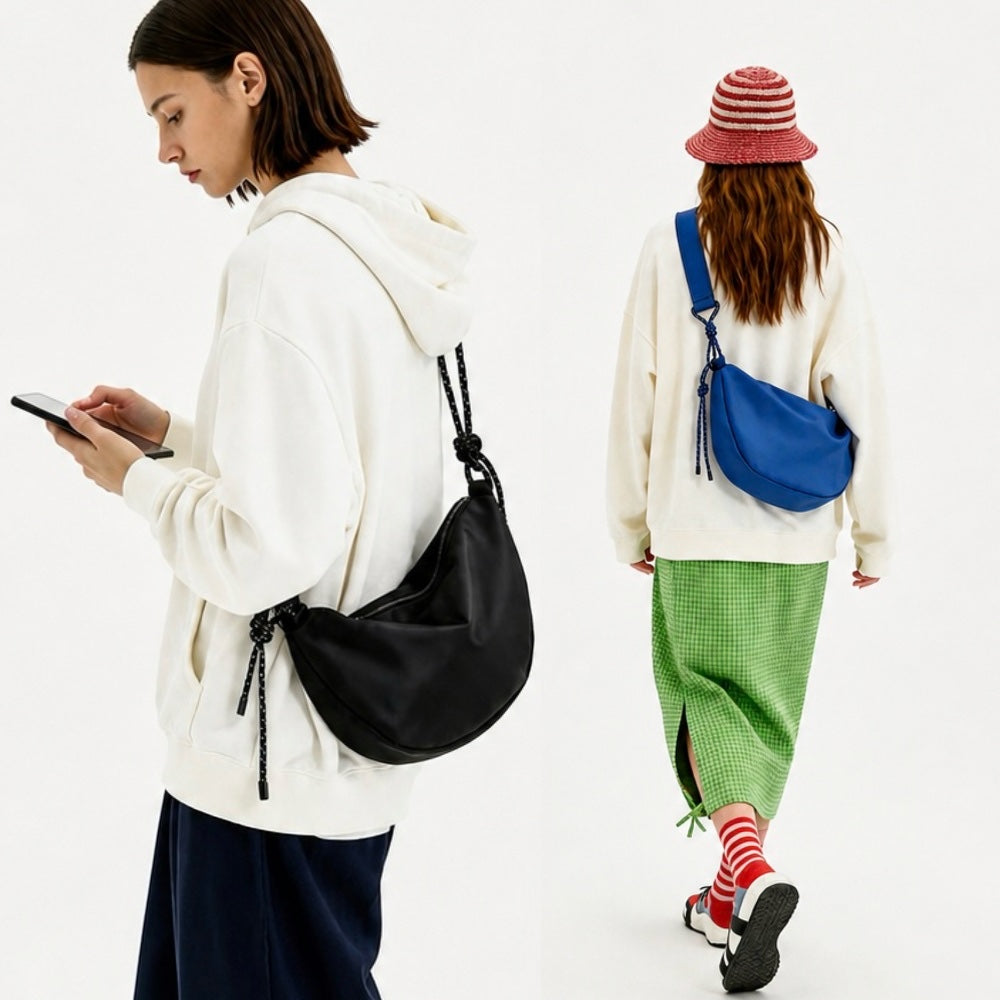 Sac bandoulière demi-lune en nylon noué de façon décontractée